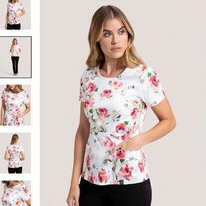 Jaanuu Peplum Scrub Top
